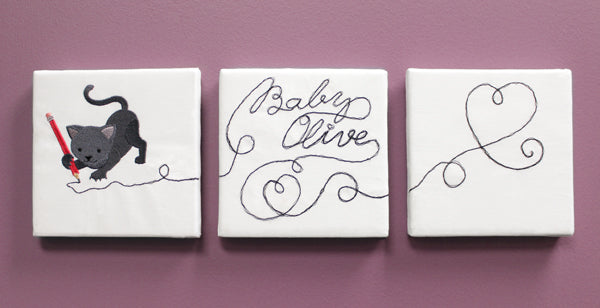 Completed Doodle Stitch Wall Hanging project, featuring Creative Cat design