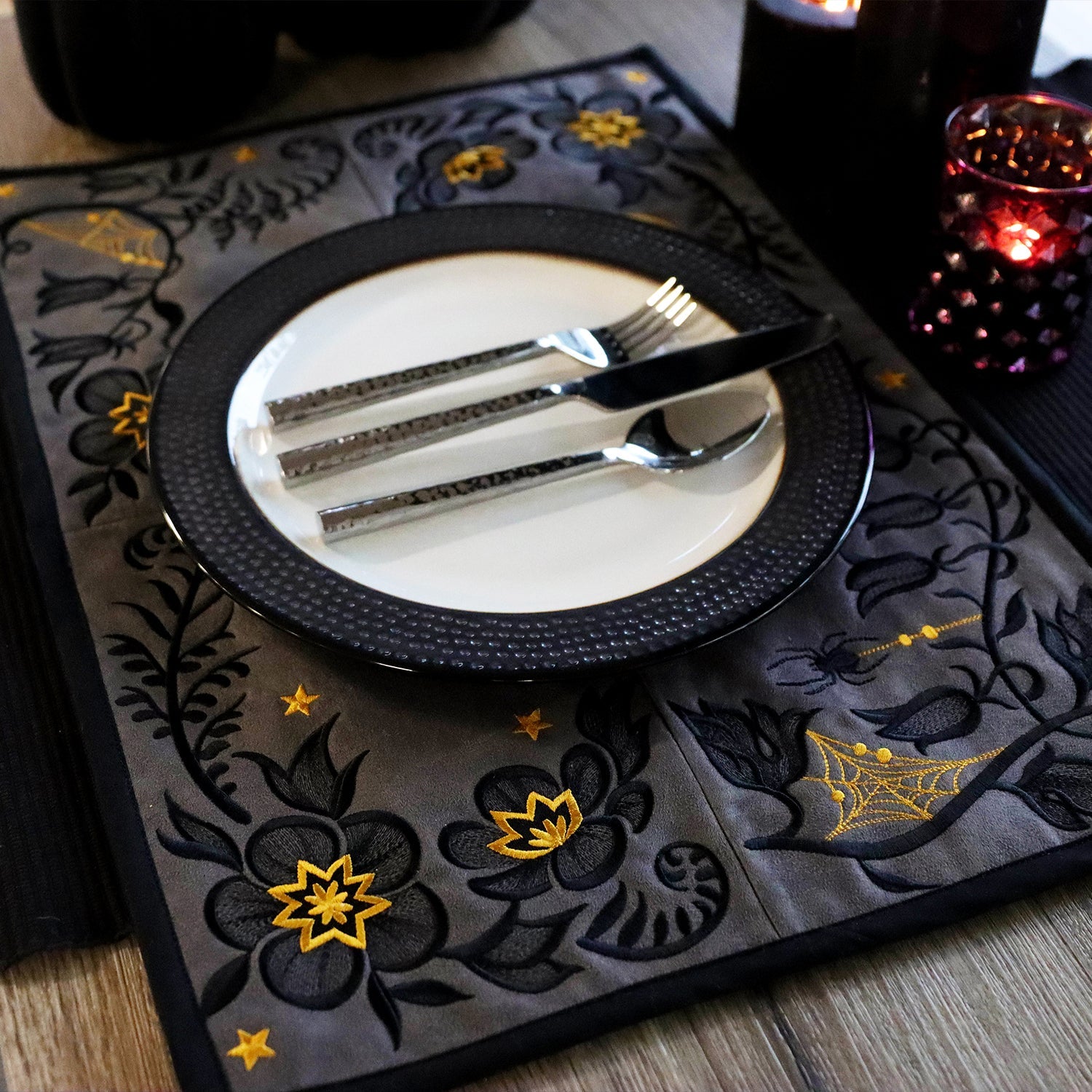 Spooky floral placemat created with four paneled machine embroidery designs
