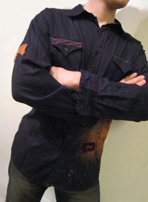Man modeling Bleached Grunge Shirt, featuring Barbed, Punk, and How the West Was Won designs