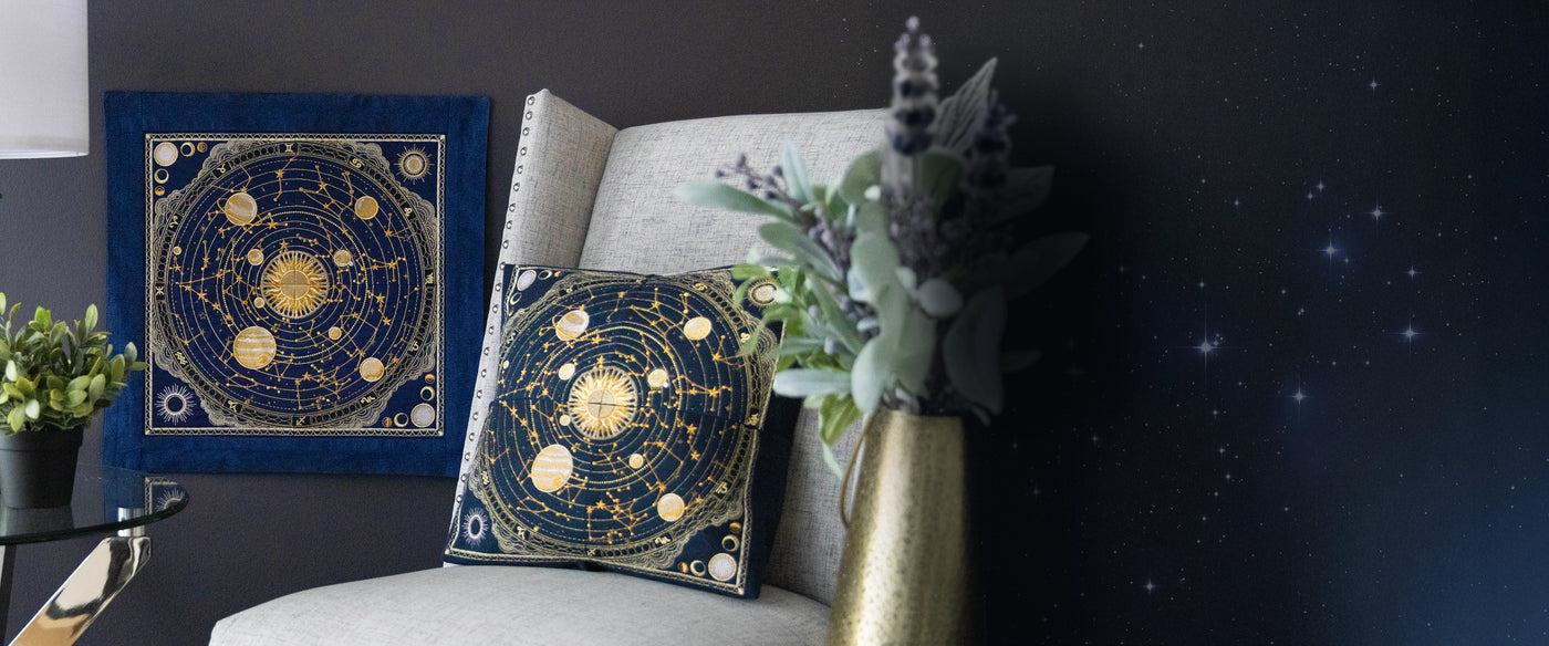 Machine embroidery star constellation design on a pillow and a wall hanging.