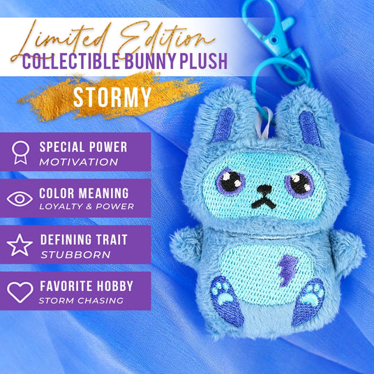 Blue collectible machine embroidery bunny plush with keychain on a blue background