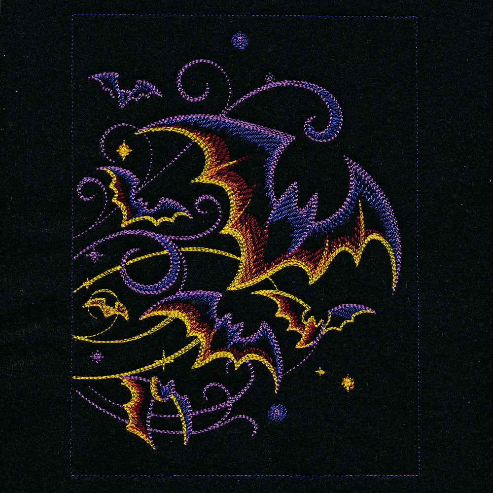 Digitally downloadable machine embroidery design featuring stitched jack-o-lanterns and Halloween-themed elements.