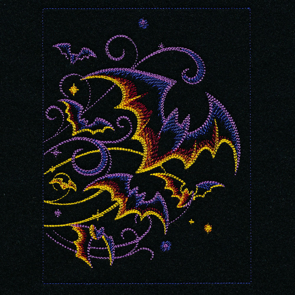 Embroidered bats and swirling patterns in bright colors on a black background, shown as a machine embroidery design.
