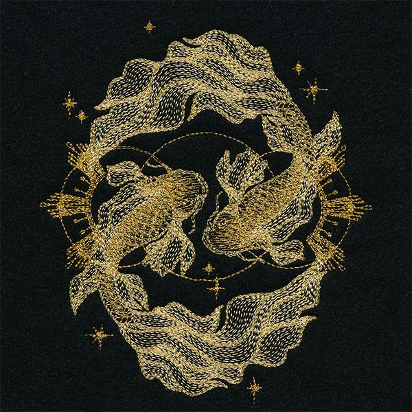 Two golden koi fish embroidered swimming among stars on a dark background in this digitally downloadable embroidery design.
