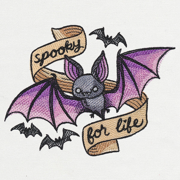 Digitally downloadable machine embroidery design of a bat with purple wings on a white background.