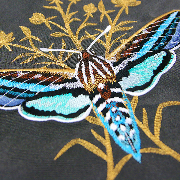 Luminous Moth in Flight