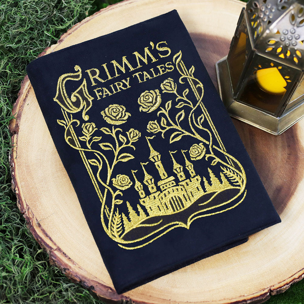 journal cover featuring a machine embroidery design of Grimm's Fairytales