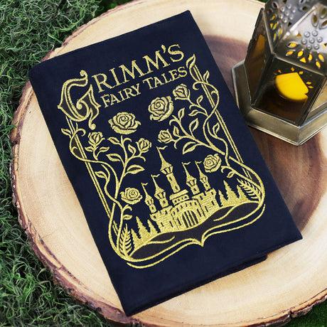 journal cover featuring a machine embroidery design of Grimm's Fairytales