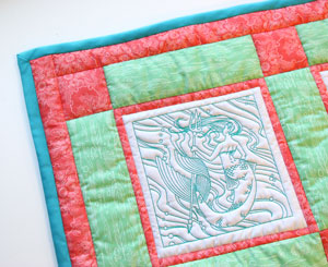 Quilting with Embroidery Designs