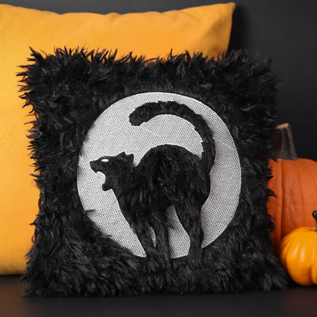 machine embroidery embossed design of a Halloween cat on a fluffy pillow