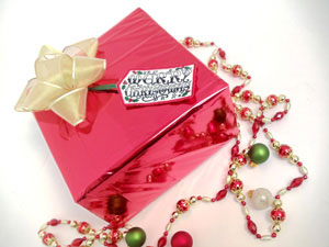 machine embroidered gift tag on a Christmas gift