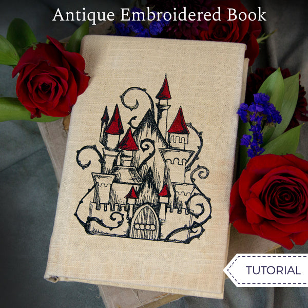 machine embroidery design of a castle on a fabric wrapped book
