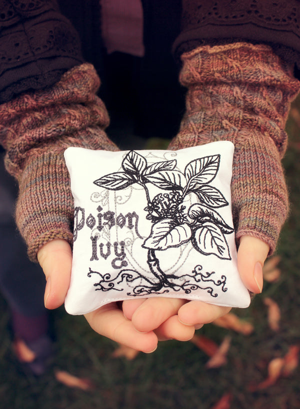Completed Handwarmer project, featuring Pretty Poison - Poison Ivy design