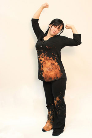 Woman wearing Bleached Celestial Pajamas, featuring Pegasus design