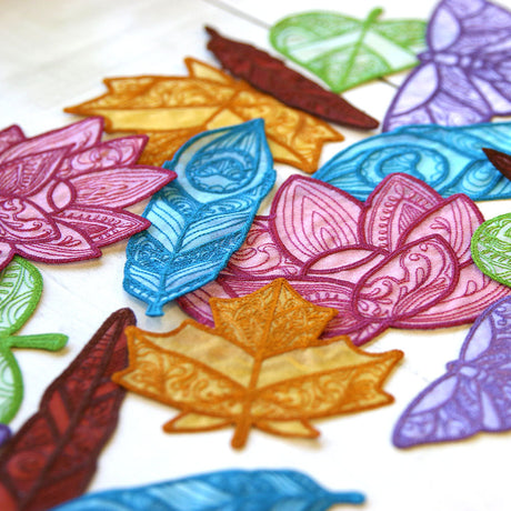 organza machine embroidery designs of leaves, flowers and feathers