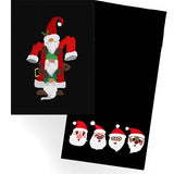 Embroidery embroidery of two gnomes in red and green clothes on a black cloth, and four Santa faces with varied skin tones on another black cloth.
