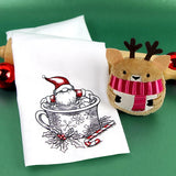White cloth with embroidery of Santa in a snowflake-patterned mug with holly and candy cane, next to a plush reindeer with a red scarf on green background.