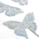 Fluttering Moth Trio