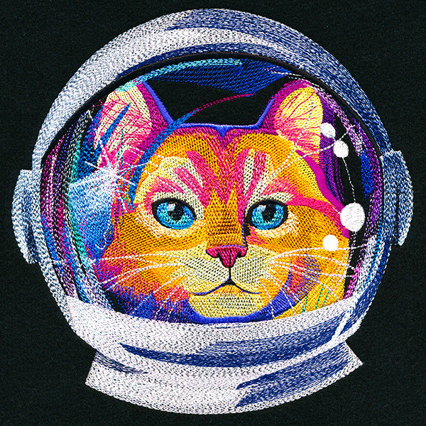 Colorful machine embroidery design of a cat wearing an astronaut helmet, stitched on a black background.