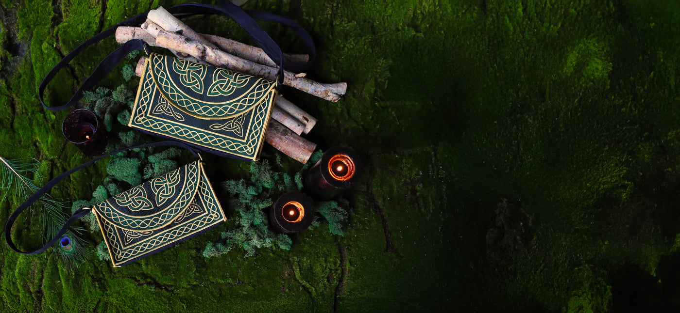 Machine embroidery Celtic purses on greenery 